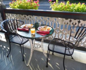 Table set for two for outdoor breakfast